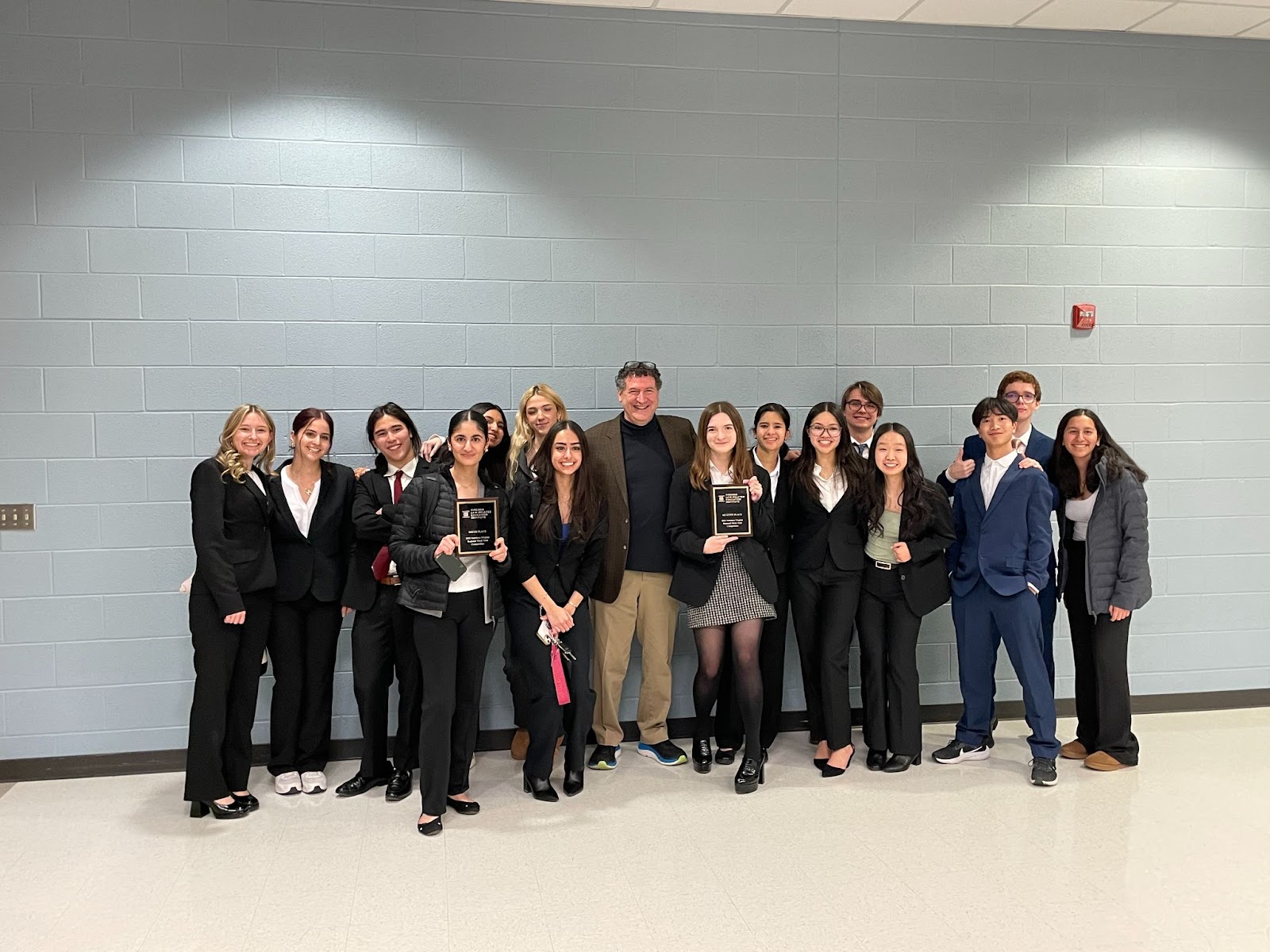 Mock Trial Teams pose for group picture