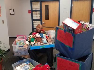 Mr Yarborough gathers toys for delivery