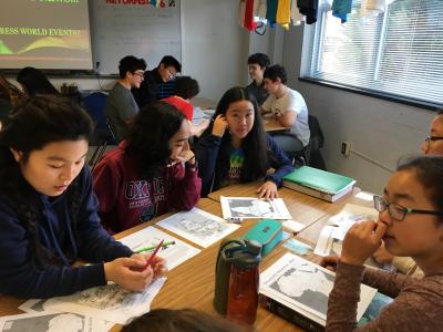 Students work on peace terms in Mr. Wright's history class.